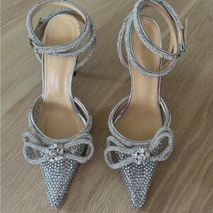 MACH & MACH
Double Bow Crystal-Embellished PVC Pumps